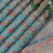 Shamrock green gold zari and multi color meena work rama blue meena work border jacquard tissue silk saree
