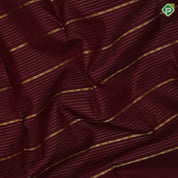 Dark maroon gold zari velthari lines thilagam butta rani pink gold zari peacock thilagam butta lines border traditional silk saree