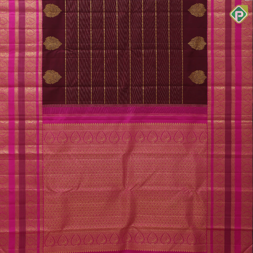 Dark maroon gold zari velthari lines thilagam butta rani pink gold zari peacock thilagam butta lines border traditional silk saree
