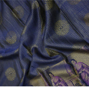 Royal Blue gold zari kattam checked round butta self thamayanthi stading posture art effect painting signature silk saree