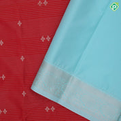 Tomato red gold zari lines and star butta design sky blue neem zari rangoli border art silk saree
