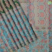 Shamrock green gold zari and multi color meena work rama blue meena work border jacquard tissue silk saree