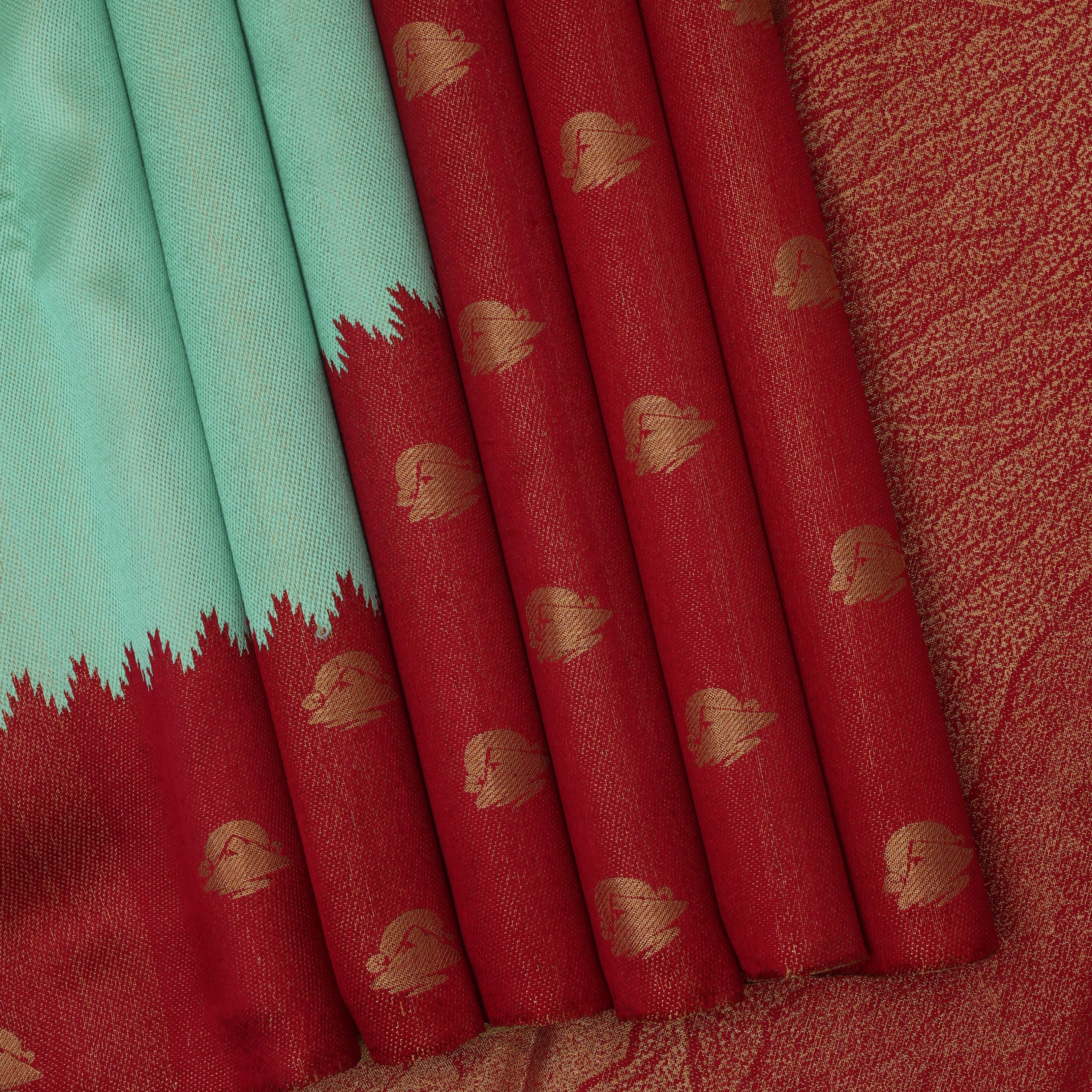 Crimson red gold zari Kailash hills design contrast pista green raising design border trendy signature silk saree