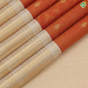 Flame orange gold zari tissue leaf buds butta design cream white gold zari mayilkan peacock butta lines border grand tissue silk saree