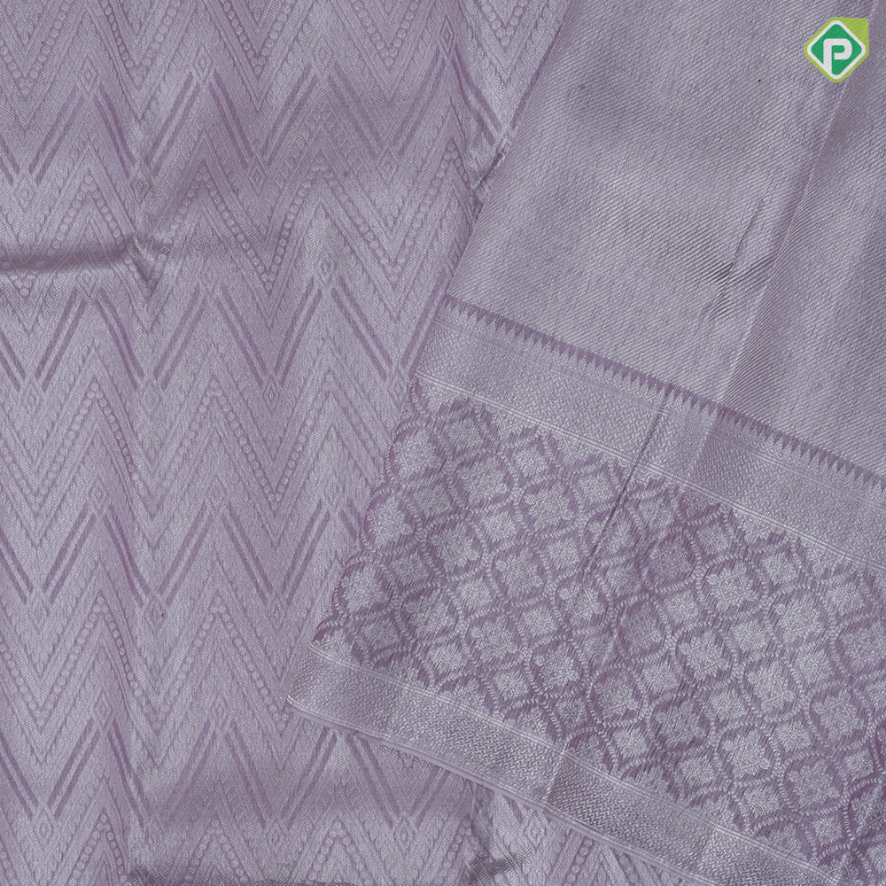 Lavender base silver zari zig zag design self silver zari fancy round border kanchi koora silk saree