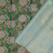 Emarald green gold zari muti color meena work design sea blue pythonic border design grand tissue silk saree