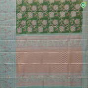 Emarald green gold zari muti color meena work design sea blue pythonic border design grand tissue silk saree