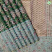 Emarald green gold zari muti color meena work design sea blue pythonic border design grand tissue silk saree