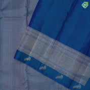Peacock blue silver gold zari tissue design self edge peacock butta border grand bridal silk saree