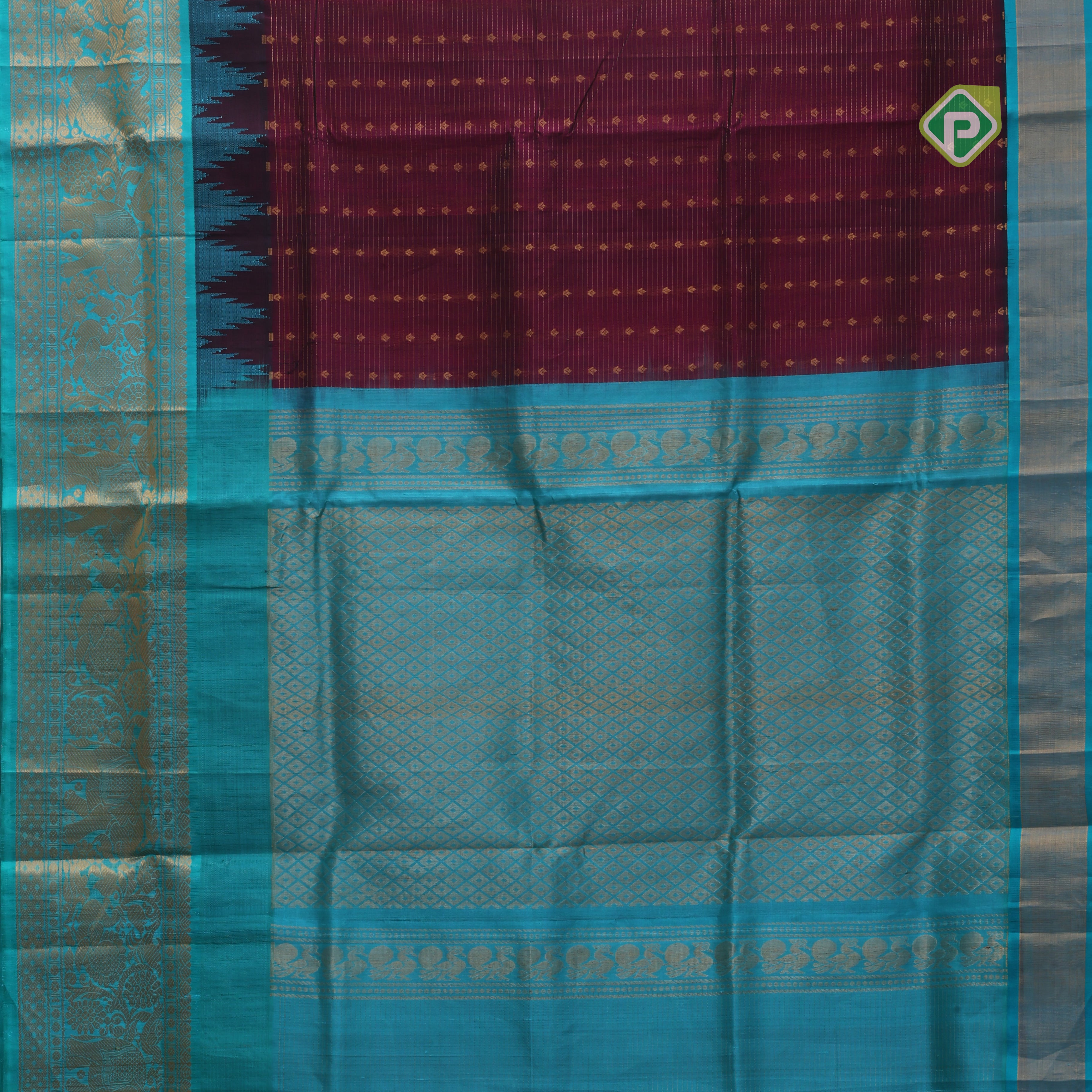 Magenta pink gold zari lines thilagam buttas design rama blue gold zari border silk cotton saree