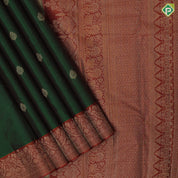 Emarald green gold zari fancy butta motifs contrast red gold zari banaras style border gift silk saree