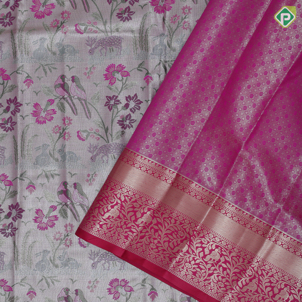 Pewter pink base multi color wild effect design dark green gold zari floral birds design border tissue art silk saree