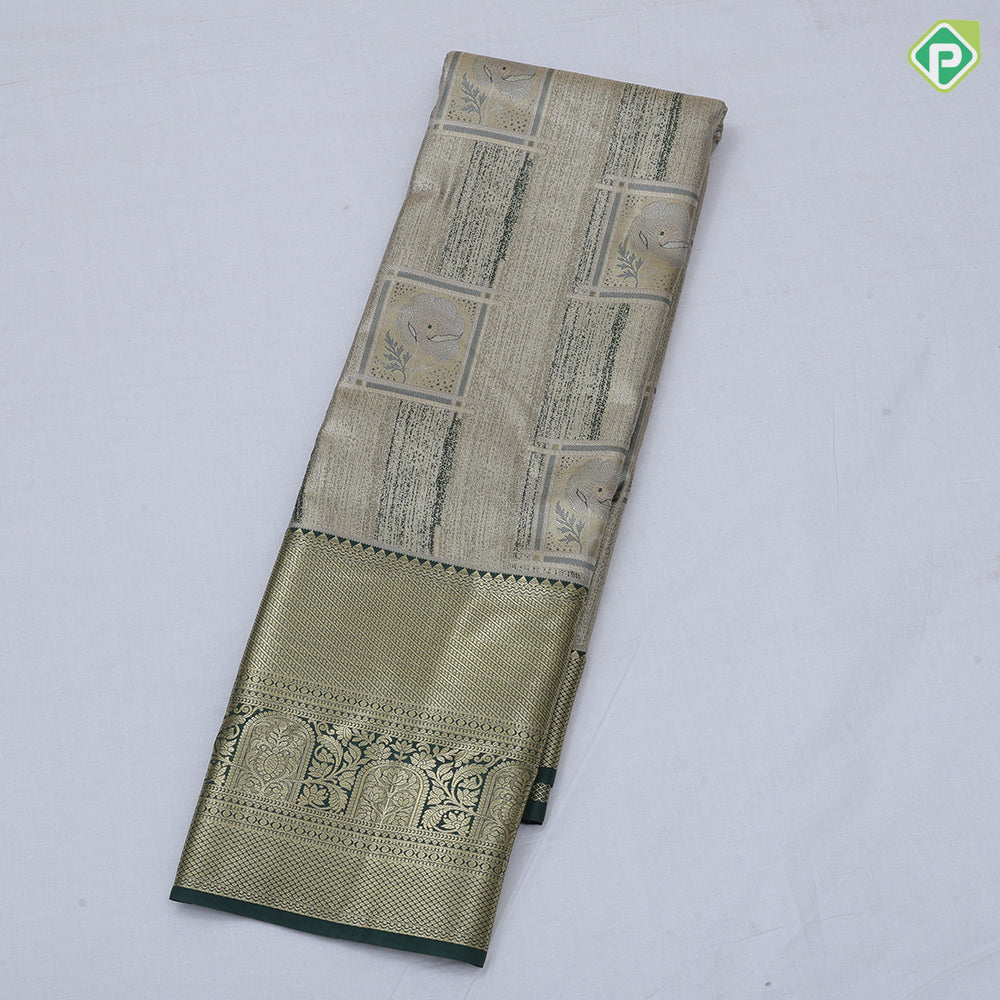 green base pastel red frame flower design self color gold zari grand border tissue art silk saree