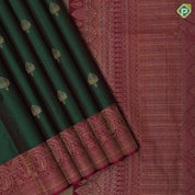 Emarald green gold zari leaf butta motif purple gold zari peacock banaras style design border gift silk saree