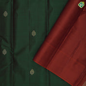 Emarald green gold zari fancy butta motifs contrast red gold zari banaras style border gift silk saree