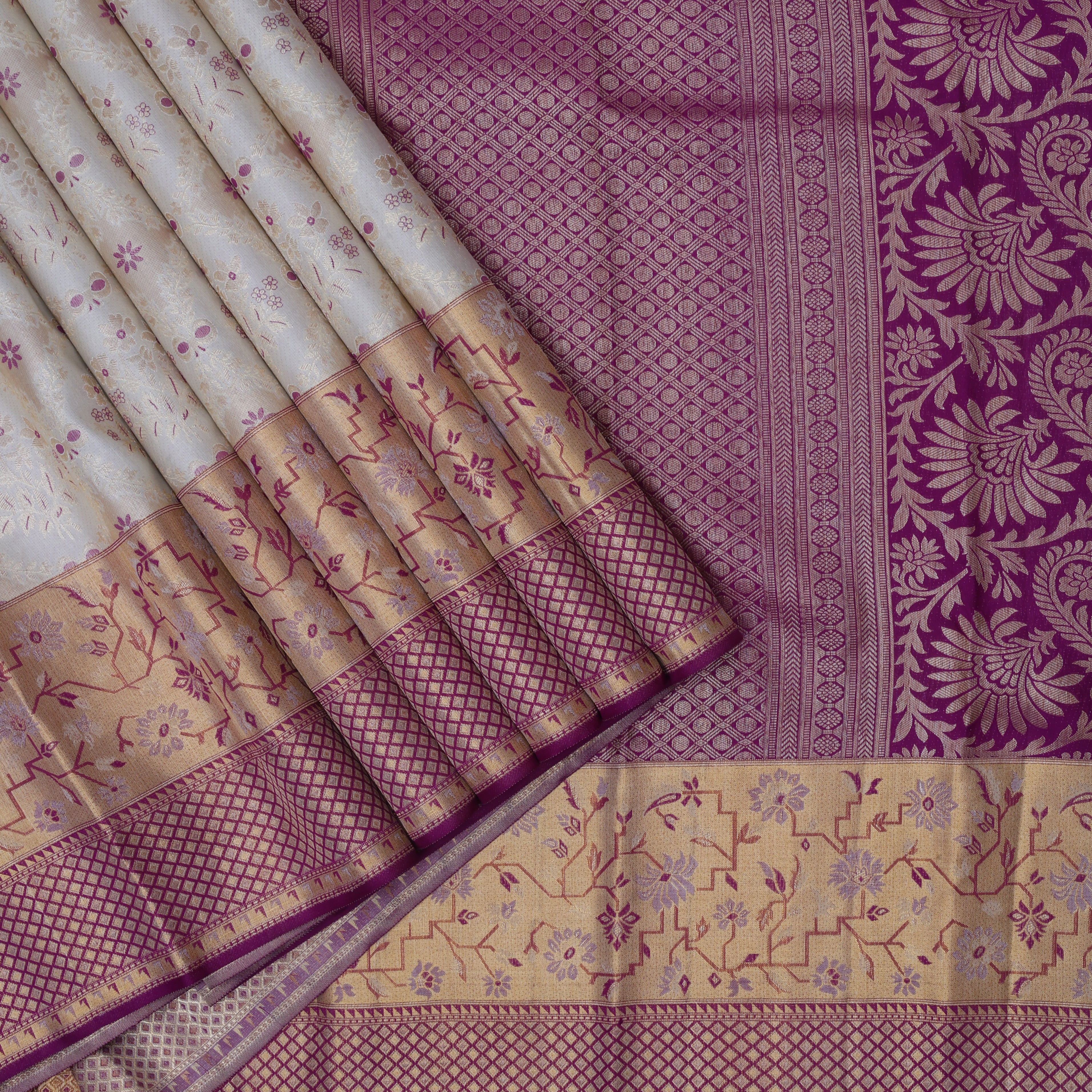 Milk Cream gold zari meena work floral design contrast magenta pink gold zari pythonic border grand bridal silk saree