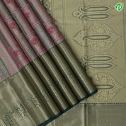 green base pastel red frame flower design self color gold zari grand border tissue art silk saree