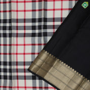 Cream base multi color barbarian chennai checks design Black with gold zari zig zag border Traditional silk saree