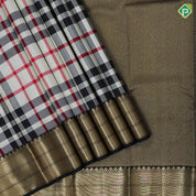 Cream base multi color barbarian chennai checks design Black with gold zari zig zag border Traditional silk saree