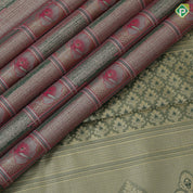 green base pastel red frame flower design self color gold zari grand border tissue art silk saree