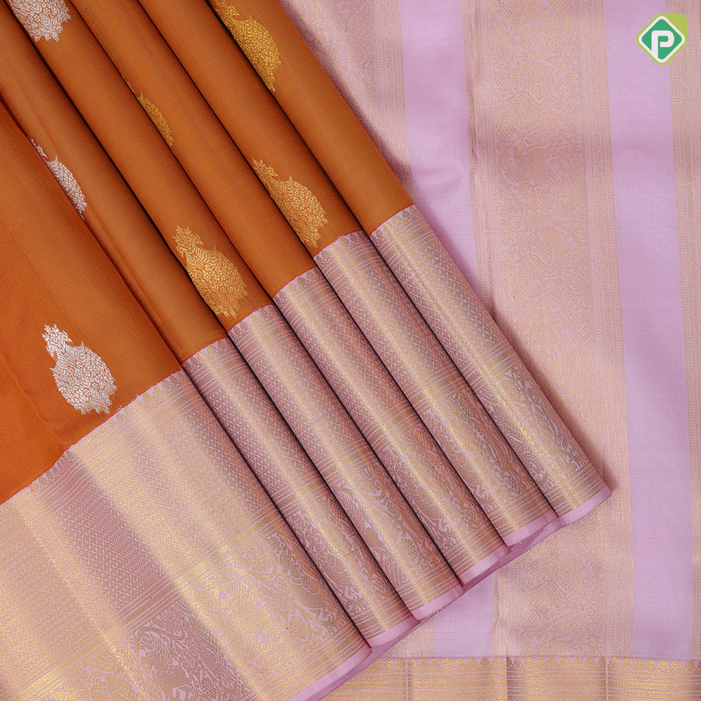 Honey orange silver gold zari thilagam butta light pink gold zari diamond and creeper design border organza silk saree