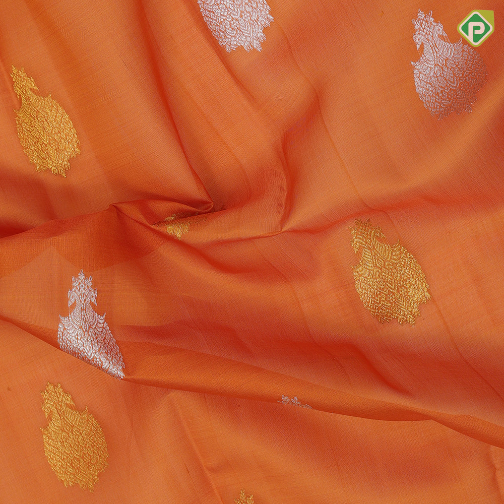 Honey orange silver gold zari thilagam butta light pink gold zari diamond and creeper design border organza silk saree