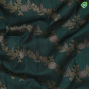 Dark green pink and gold zari floral creeper design pink gold zari zig zag border kora silk saree
