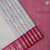 Cream color silver zari flying bird and flower round butta rani pink silver gold zari border linen kora silk saree