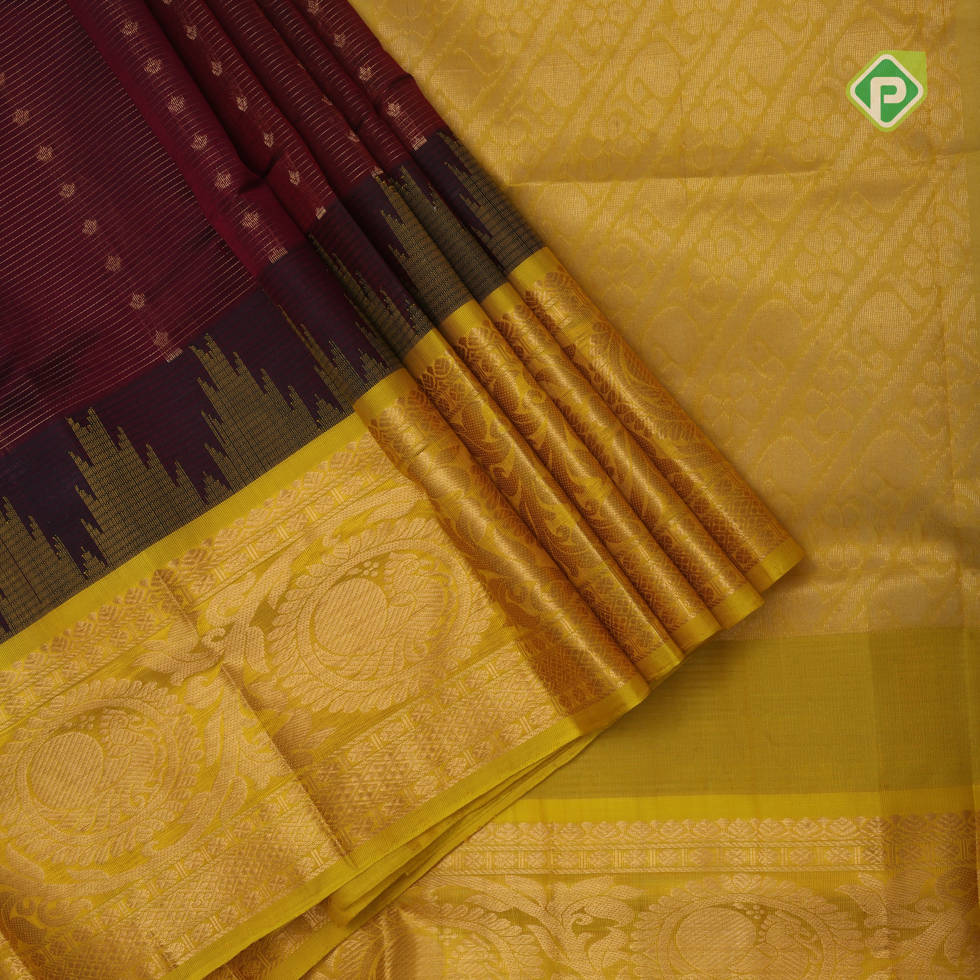 Maroon red gold zari lines thilagam buttas design Lemon yellow gold zari border silk cotton saree