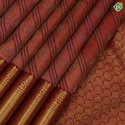 Honey Orange shimmer tissue peacock chakkaram cross self big round high border grand bridal silk saree