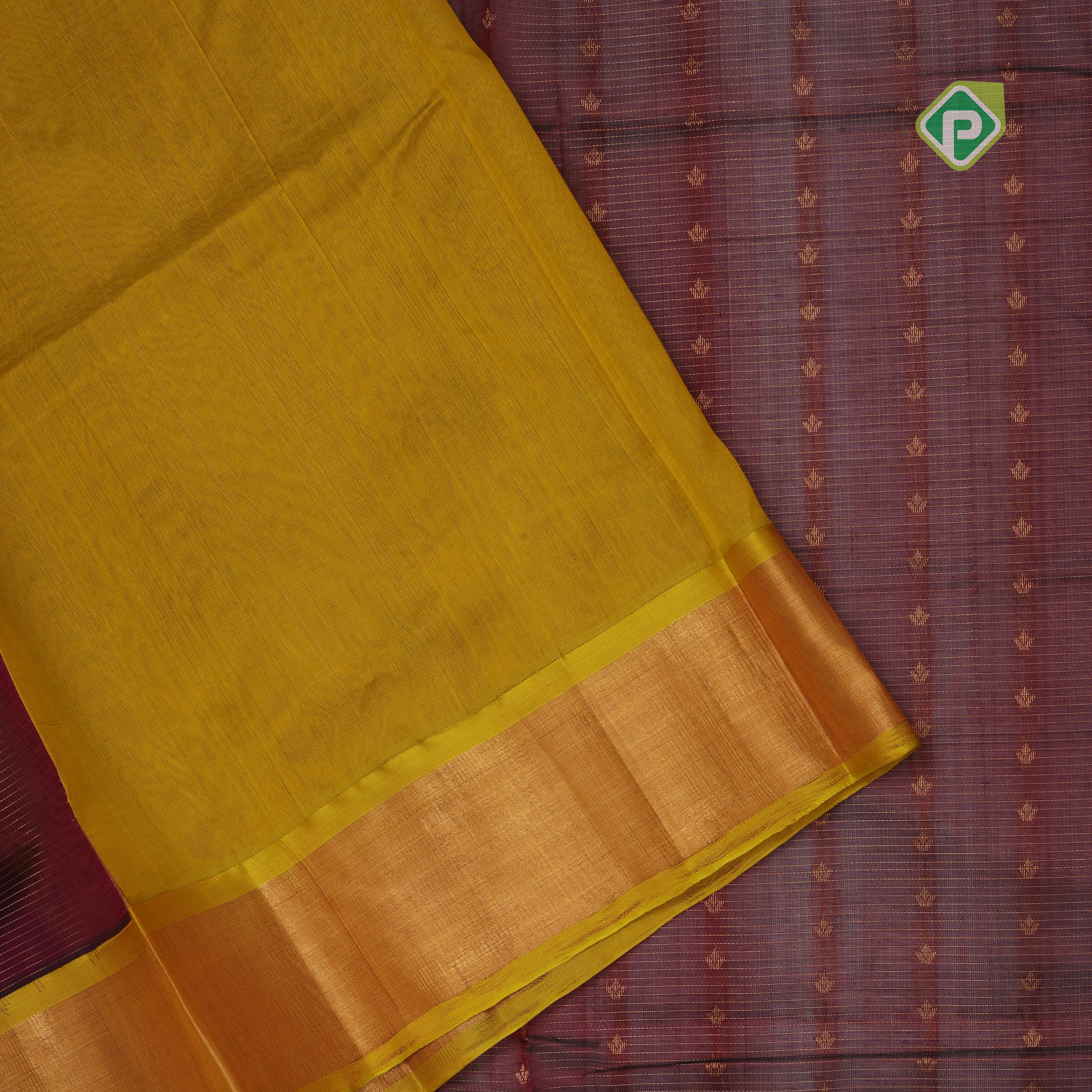 Maroon red gold zari lines thilagam buttas design Lemon yellow gold zari border silk cotton saree