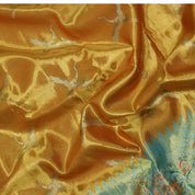 Orange silver zari swan meena work contrast green jaamthani border bridal tissue silk saree