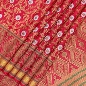 Chilly Red Self Colour With Gold Zari With Green Thread Meena Work Grand Border Exclusive Bridal Silk Saree