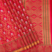 Chilly Red Self Colour With Gold Zari With Green Thread Meena Work Grand Border Exclusive Bridal Silk Saree