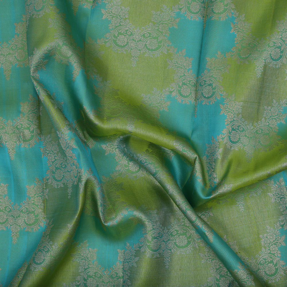 Dual green tone with silver gold zari rankat design self color bavanji border bridal silk saree