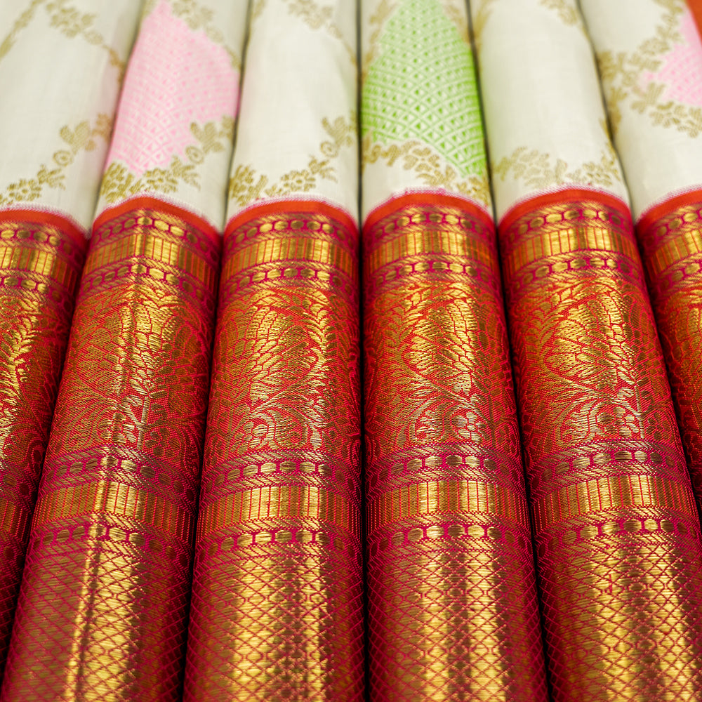 Cream White With Orangish Pink Floral Work Grand Bridal Silks Saree