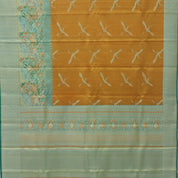 Orange silver zari swan meena work contrast green jaamthani border bridal tissue silk saree