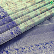 Cardamon Green With Gold Zari Weaved Floral And Royal Blue Grand Silk Saree