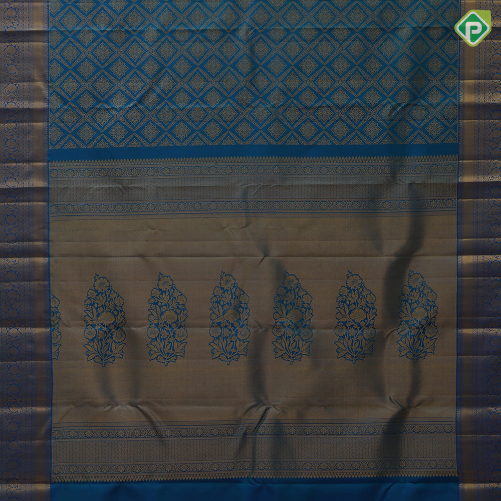 Peacock blue gold zari grand star diamond self gold zari rangoli border bridal silk saree