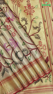 mustard gold big floral weaved design self pythonic border grand tissue silk saree