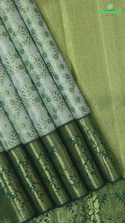 green base with silver and gold zari grand hand woven gold zari lotus design border exclusive bridal silk saree