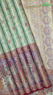 Pista green silver gold zari grand floral meena work design contrast pythonic border grand bridal silk saree