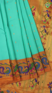 Rexona Green Thousand Butta Contrast Orange Meena Work Border Gadwal Silk Saree