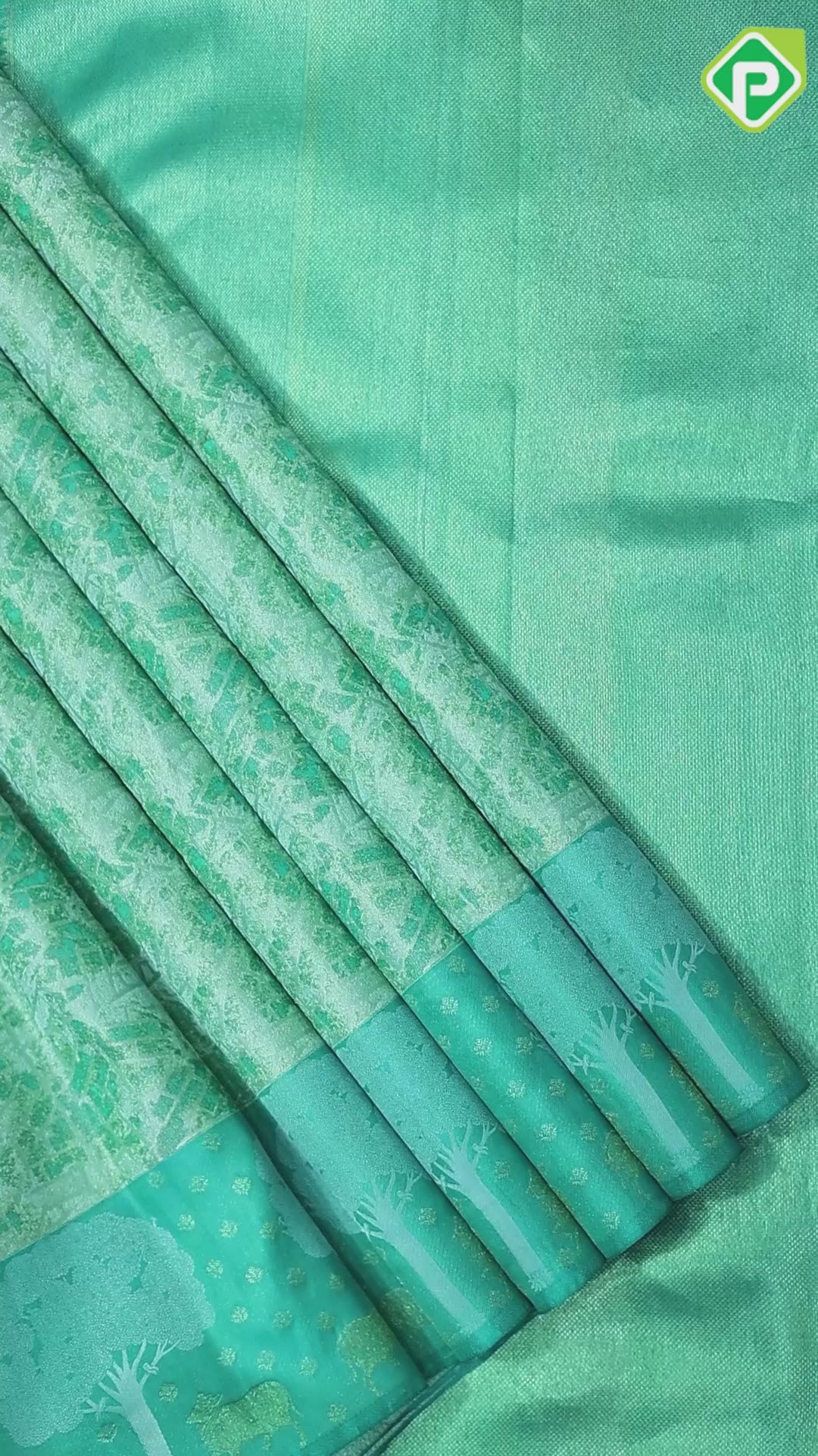 Multi green shade self modern art weaved design jungle green cow under tree design border pichwai silk saree