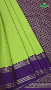 Parrot green gold zari checkered peacock butta design contrast purple rettapet border art silk gift saree