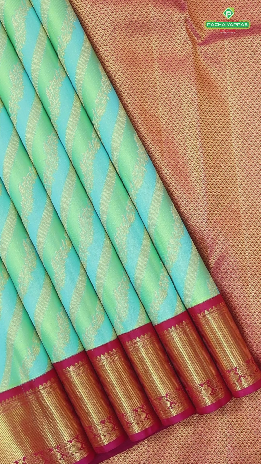 Pista green sky blue and gold zari cross lines design contrast pink gold zari border grand bridal silk saree