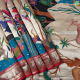 Black With Multi Colour Pythonic Design Tree weaved And Rani Red With Gold Zari Pythonic Border Art Silk Saree