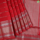 Tomato Red With Gold Zari Thick Lines Design And Self Colour Silver And Gold Zari Peacock Retta Pet Gold Gap Border Soft Silk Saree-Tomato Red