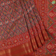 Orangish Pink With Ikkat Pochampalli Printed Design And Peach Red With Gold Zari Border Fancy Saree