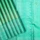 Sea Green With Silver Zari Zig Zag Stripes With Sky Blue Small Silk Thread Butta Design And Peacock Green With Silver Zari Floral Rangoli Design Border Traditional Silk Saree